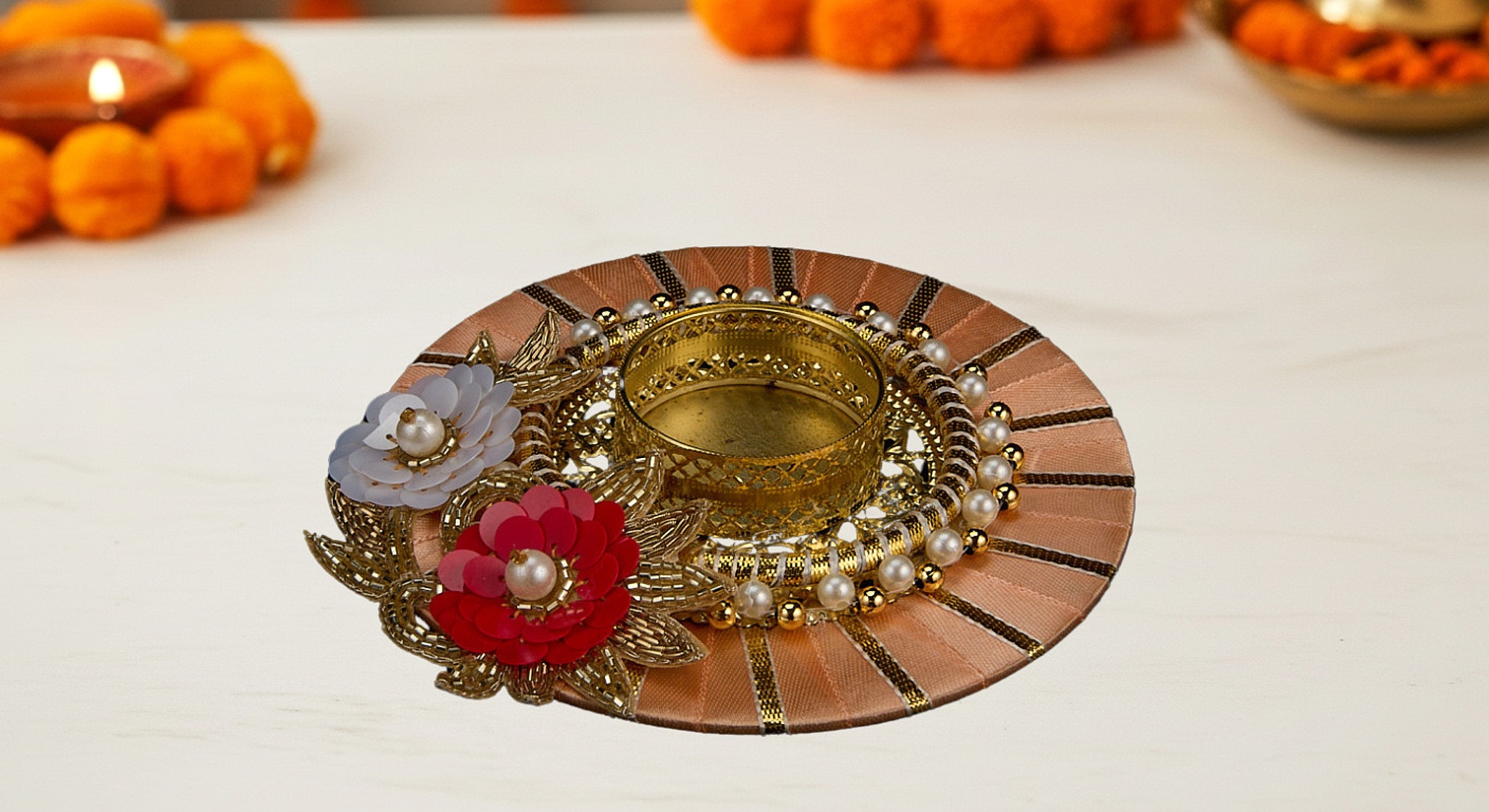 Three dual diya favor sets in vibrant organza bags showing blue pink and yellow colors with handcrafted fabric and metal diyas for Diwali favors