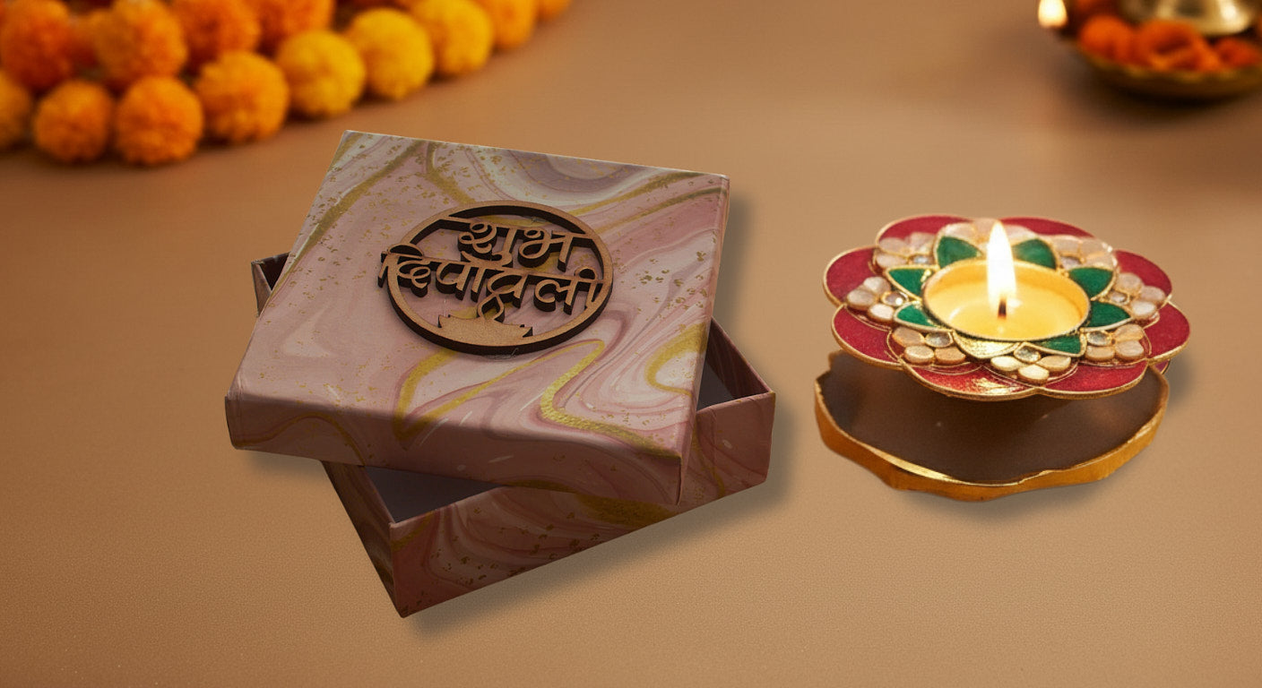 Decorative meenakari diya with tea light illuminated showing intricate enamel flower design on agate stone base for Diwali decor