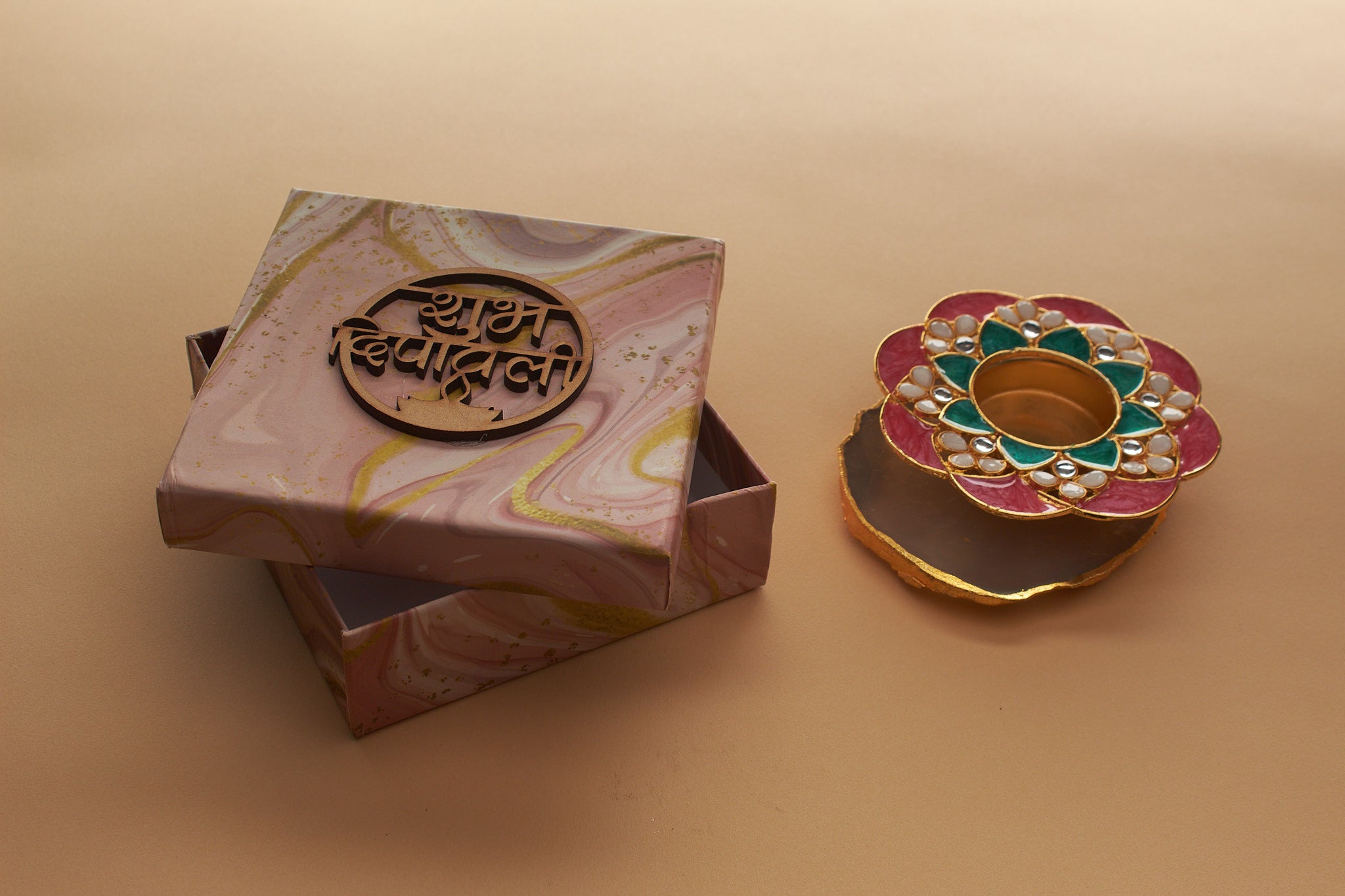 Premium meenakari lotus diya with vibrant pink teal and gold enamel work on natural agate stone base with Shubh Diwali gift box