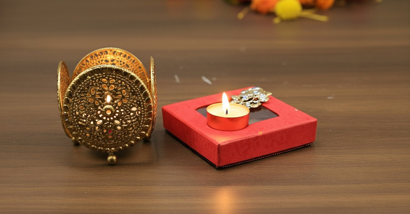 Traditional filigree diya holder and red gift box with tea light for budget-friendly Diwali party favor gifts