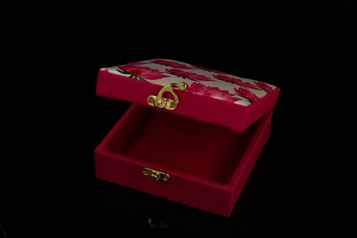 Wooden favor gift box with satin interior lining and brass hardware showing reusable storage quality for mirror work diya