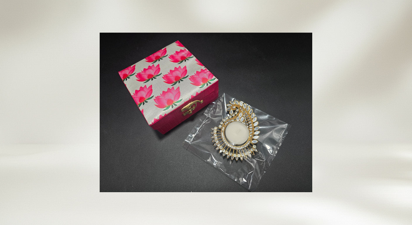 Premium mirror work diya favor in protective packaging with decorative wooden gift box showing traditional Indian shisha mirror craft