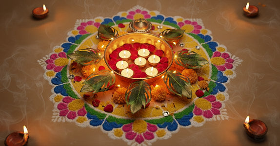 Diwali urli centerpiece with floating candles and rangoli creates authentic festival atmosphere in modern American home