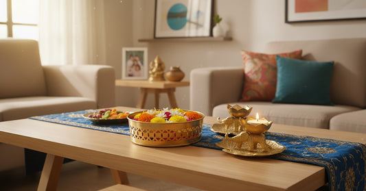 Premium Diwali gift set styled on modern living room coffee table with blue runner showing elephant basket diyas and coasters in contemporary American home