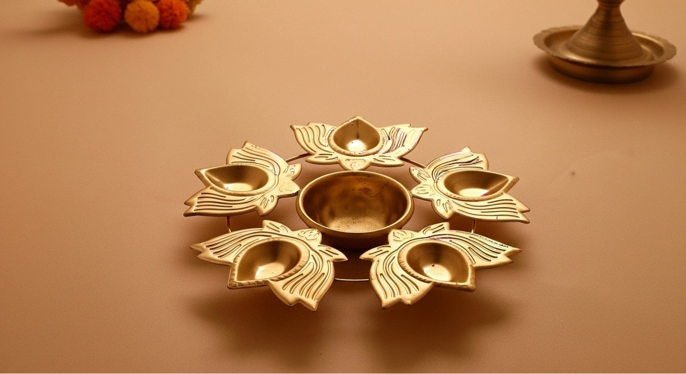 Traditional 8 inch rangoli urli diya with petal design in gold finish for oil and cotton wick Diwali lighting